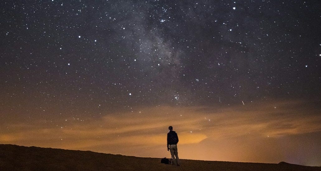 person looking at the milkyway