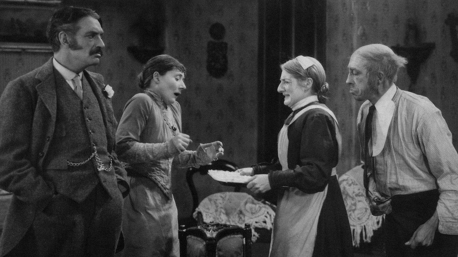 A group of people in a room

Description automatically generated