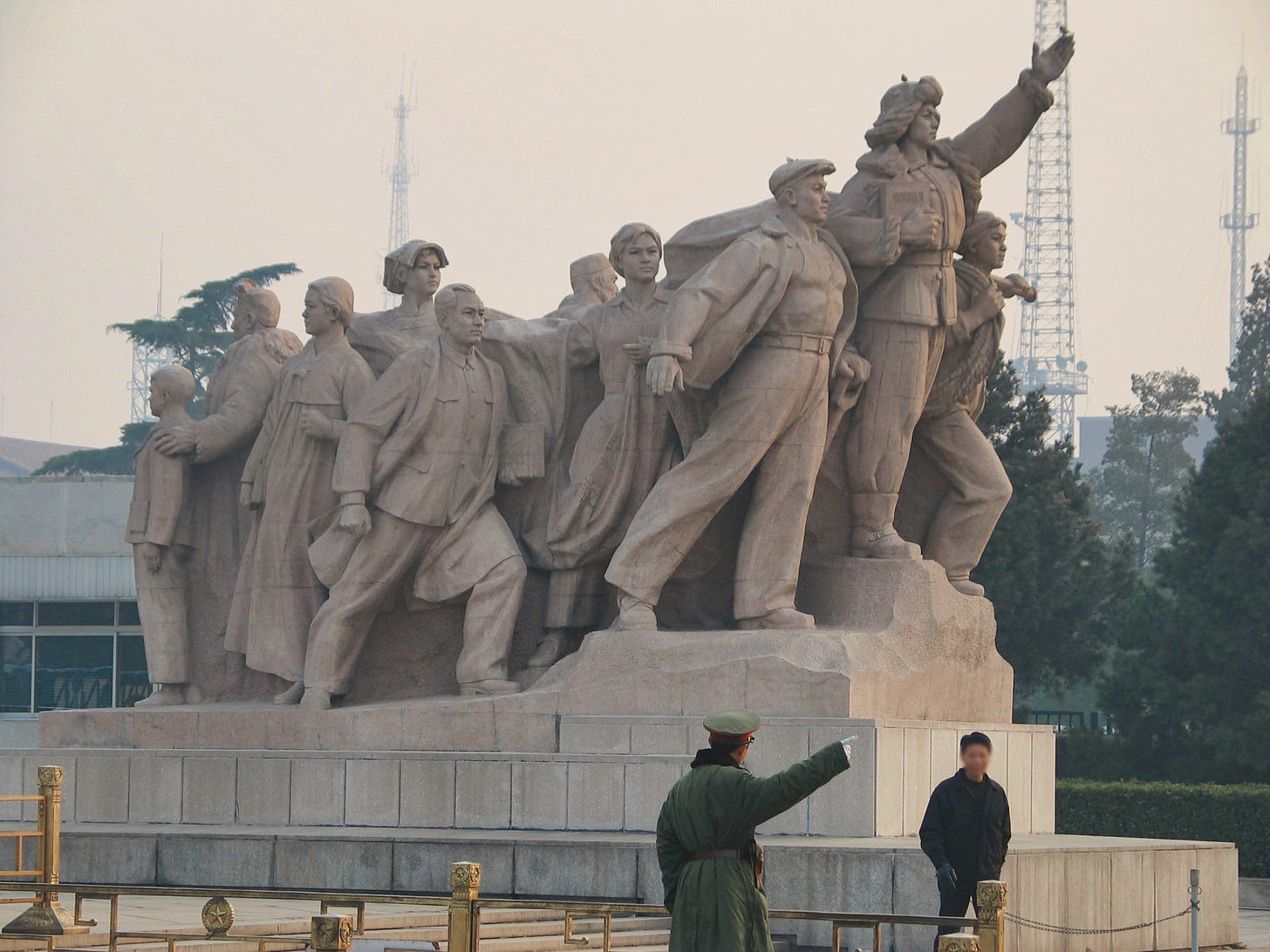 Statue in front of Mao Zedong’s Mausoleum at Tiananmen Square, depicting revolutionary unity—invoked here as a visual counterpoint to the internal fractures of Xi Jinping’s China. Statue in front of Mao Zedong’s Mausoleum at Tiananmen Square, depicting revolutionary unity—invoked here as a visual counterpoint to the internal fractures of Xi Jinping’s China.