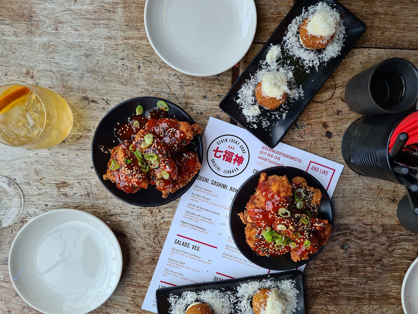 Korean fried chicken, katsu arancini at Seven Lucky Gods.