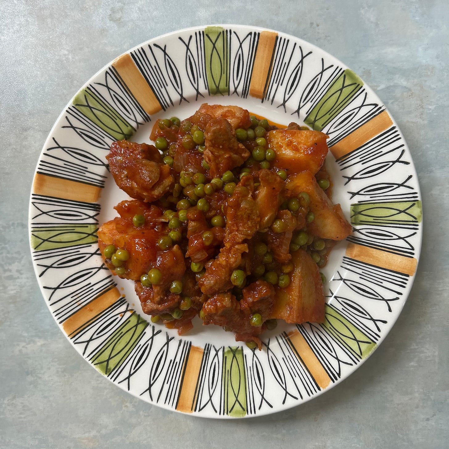pea and pork stew on a plate