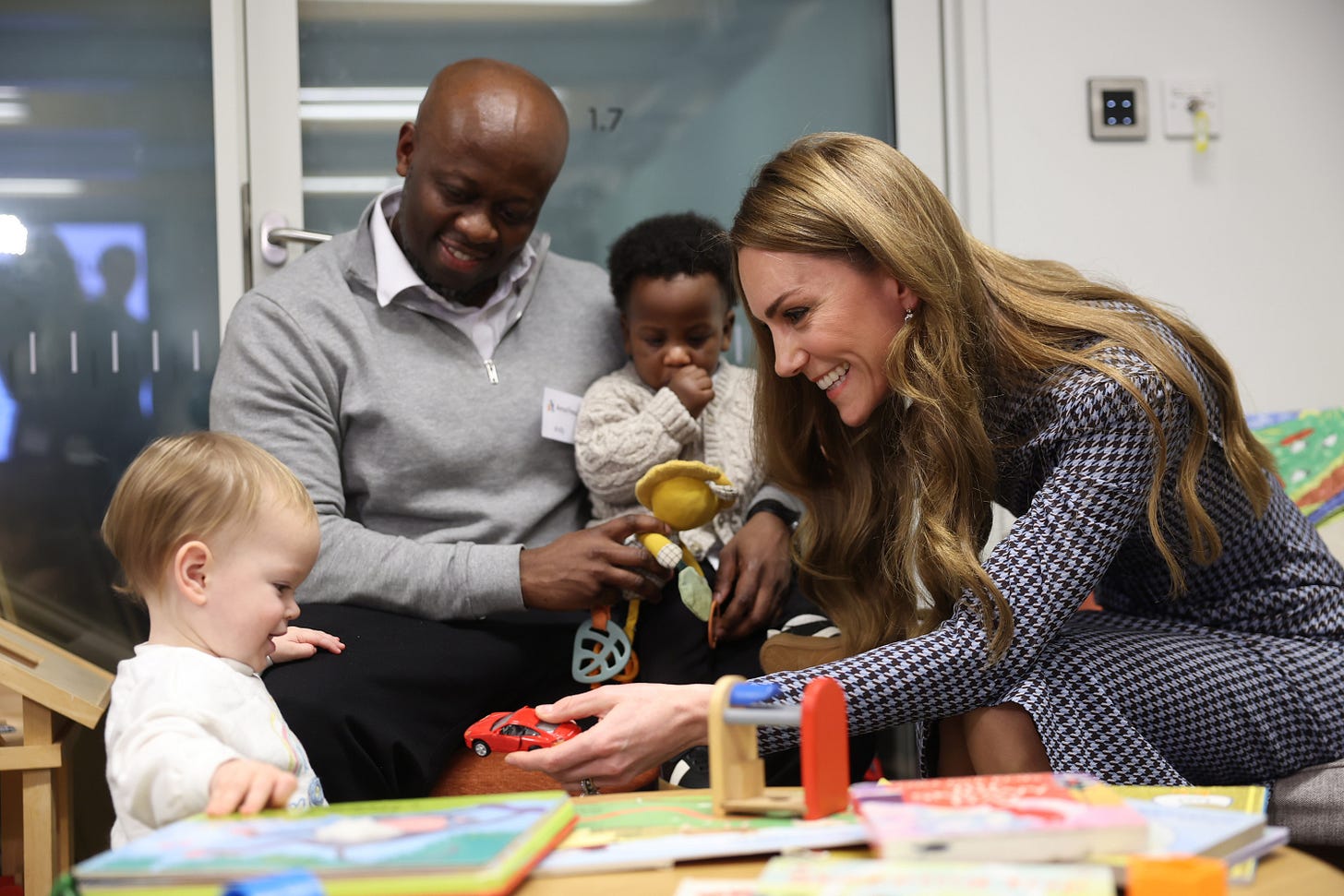 Princess Kate playing with a child