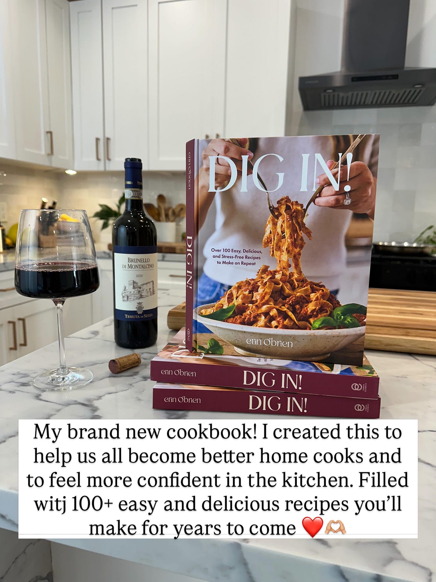 Erin O'Brien's debut cookbook, DIG IN!, with a bottle of Brunello di Montalcino.