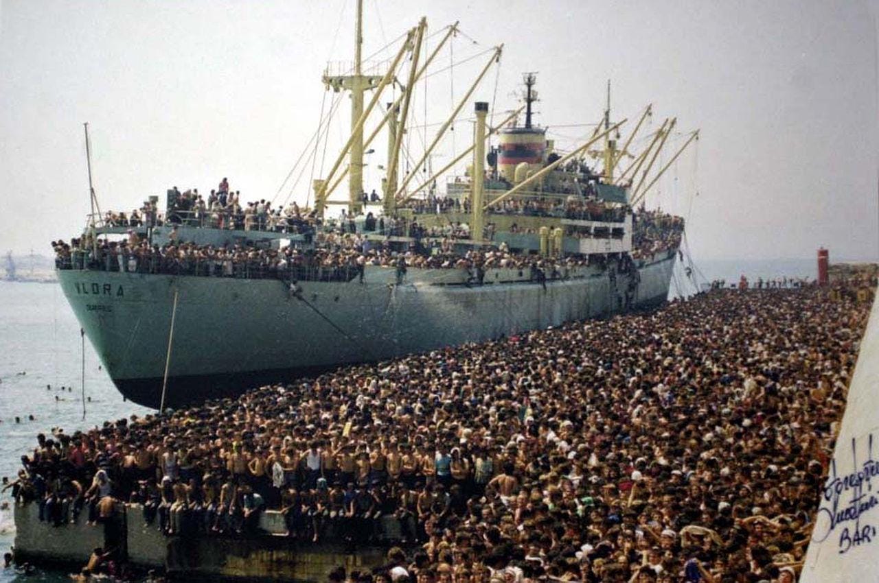 More than 20 thousand Albanian refugees in the port of Bari, Italy, after arriving on board the Vlora ship. 1991 More than 20 thousand Albanian refugees in the port of Bari, Italy, after arriving on board the Vlora ship. 1991