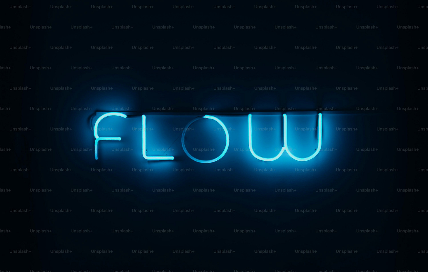 a blue neon sign that says flow