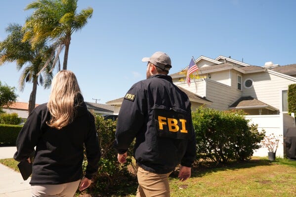 FBI agents walk door to door to try to speak with neighbors, Sunday, April 26, 2026, near an address in Torrance, Calif., connected to Cole Tomas Allen, who was identified as the shooting suspect at the White House Correspondents Dinner the night before. (AP Photo/Damian Dovarganes) FBI agents walk door to door to try to speak with neighbors, Sunday, April 26, 2026, near an address in Torrance, Calif., connected to Cole Tomas Allen, who was identified as the shooting suspect at the White House Correspondents Dinner the night before. (AP Photo/Damian Dovarganes)