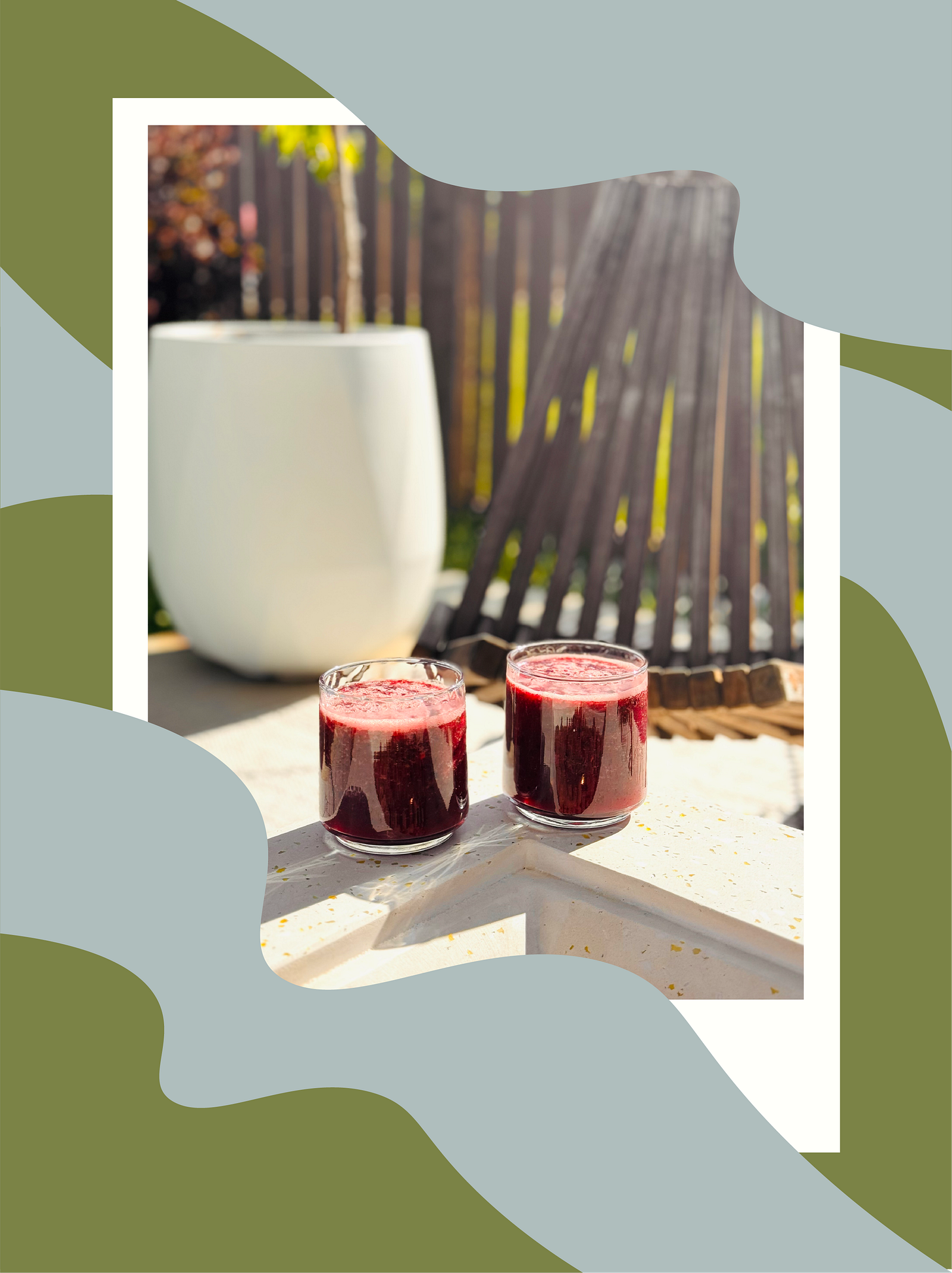 chilled watermelon, mint, blackberry drinks in two clear glasses sitting on the edge of a fire pit