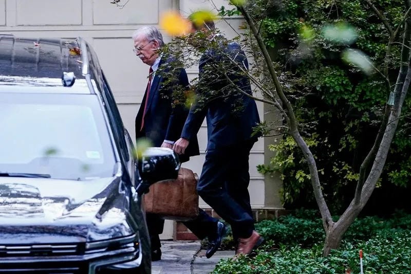 Ex Trump adviser Bolton arrives at court to surrender following charges of  mishandling classified information