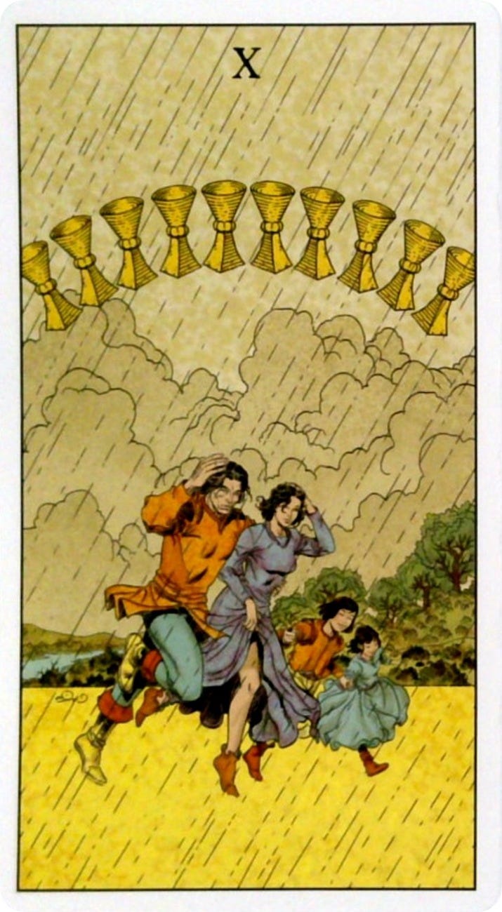 The 10 of Cups tarot card and the Transformation oracle card.