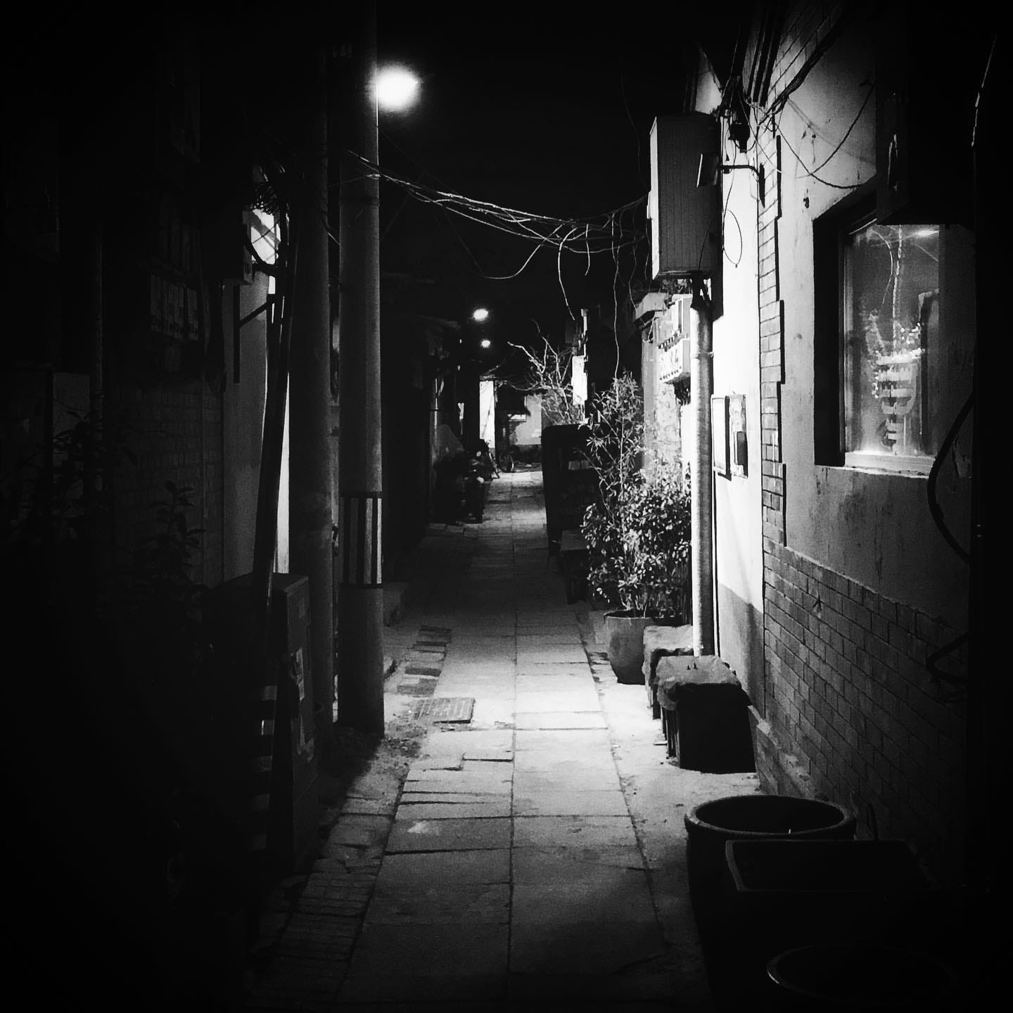 Nighttime in a quiet hutong in Beijing.