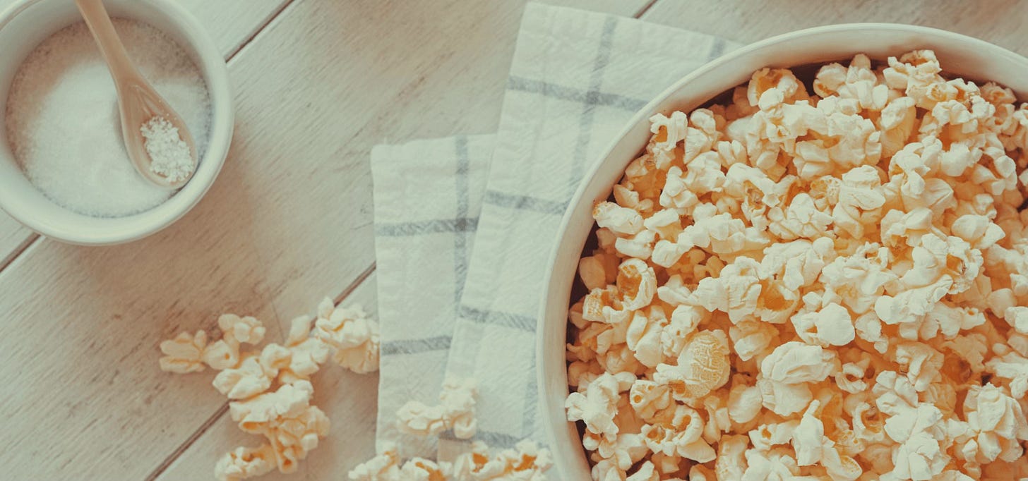 Bowl of popcorn and linen napkin Bowl of popcorn and linen napkin