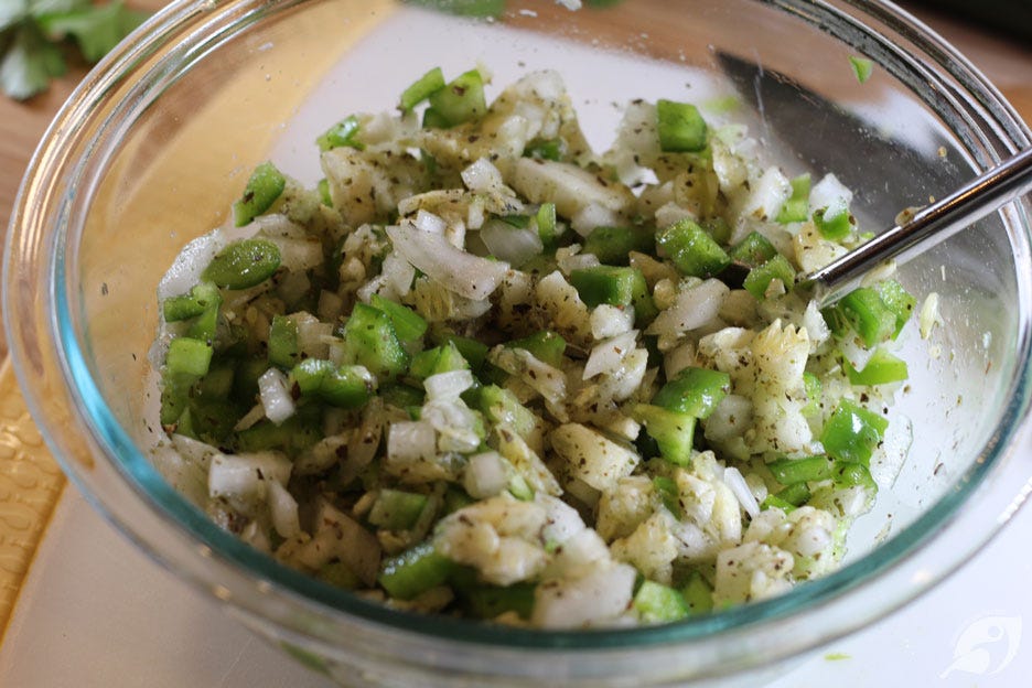 Roughly chop the reserved zucchini flesh from step one, then add the onion, pepper, and Italian seasoning blend to a bowl. Stir to combine. Roughly chop the reserved zucchini flesh from step one, then add the onion, pepper, and Italian seasoning blend to a bowl. Stir to combine.