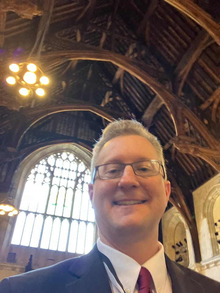 Drawing of Westminster Hall shown in the home of Winston Churchill. Newspaper and greeting card shots related to Prime Minister Boris Johnson.