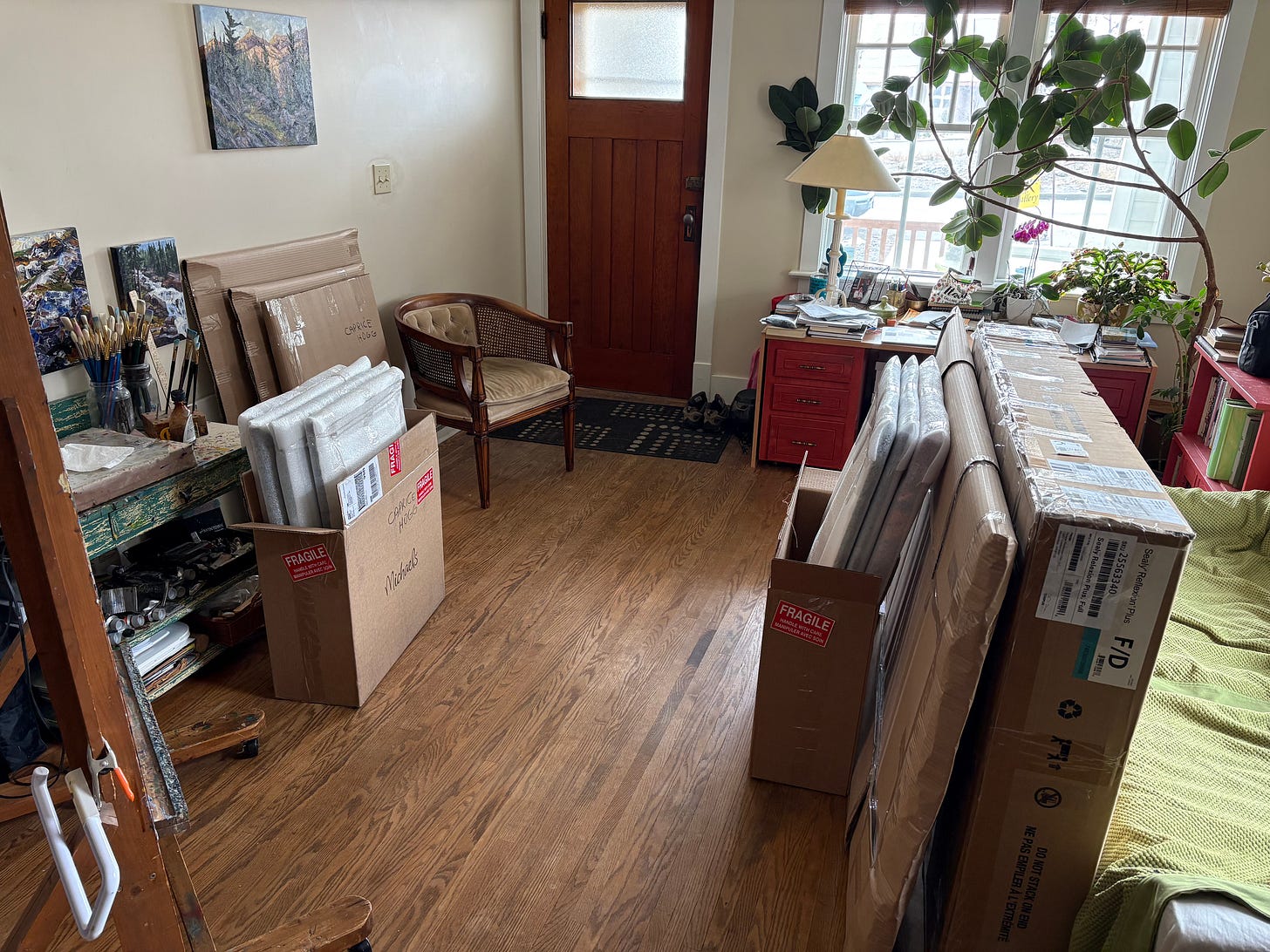 This is a photo of Caprice's oil paintings wrapped and waiting to be shipped to Medicine Hat.