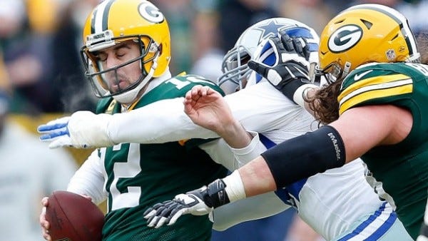 packers aaron rodgers sacked by cowboys jerremy mincey nfl 2015 images packers aaron rodgers sacked by cowboys jerremy mincey nfl 2015 images