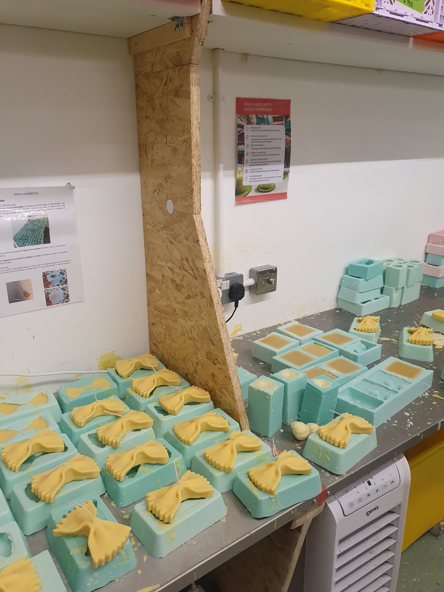 A picture of candles in their moulds