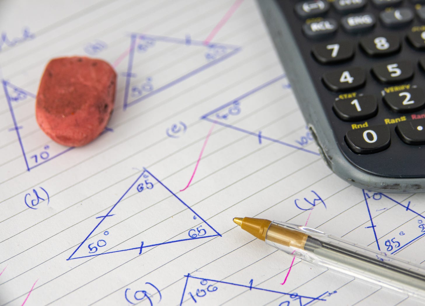 A close-up of geometry homework, representing the academic focus schools should prioritize amid increasing non-academic responsibilities