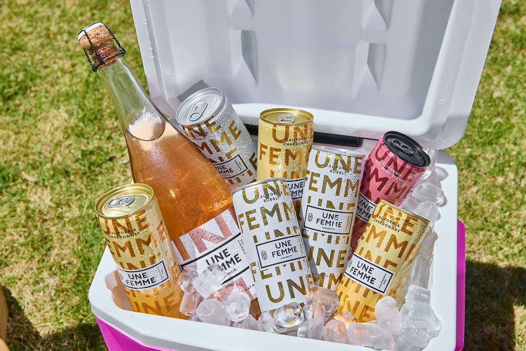 Cooler of Une Femme Wines cans and sparkling bottle. Cooler of Une Femme Wines cans and sparkling bottle.