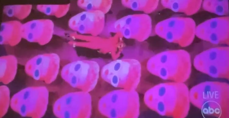 Oscar still, Ryan gosling crowd surfing on a sea of Barbie faces