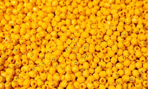 A pile of yellow legos

AI-generated content may be incorrect.
