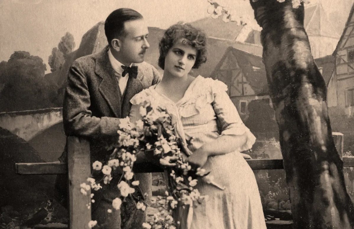 Edwardian era photograph of a man and woman representing early twentieth-century breadwinner and homemaker gender roles