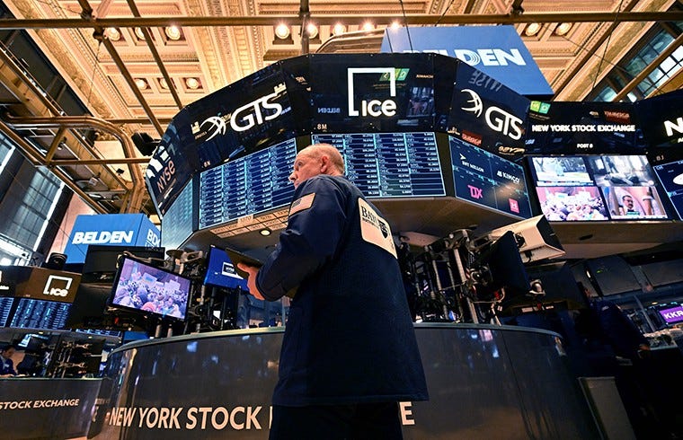 A stressed broker on the NYSE floor