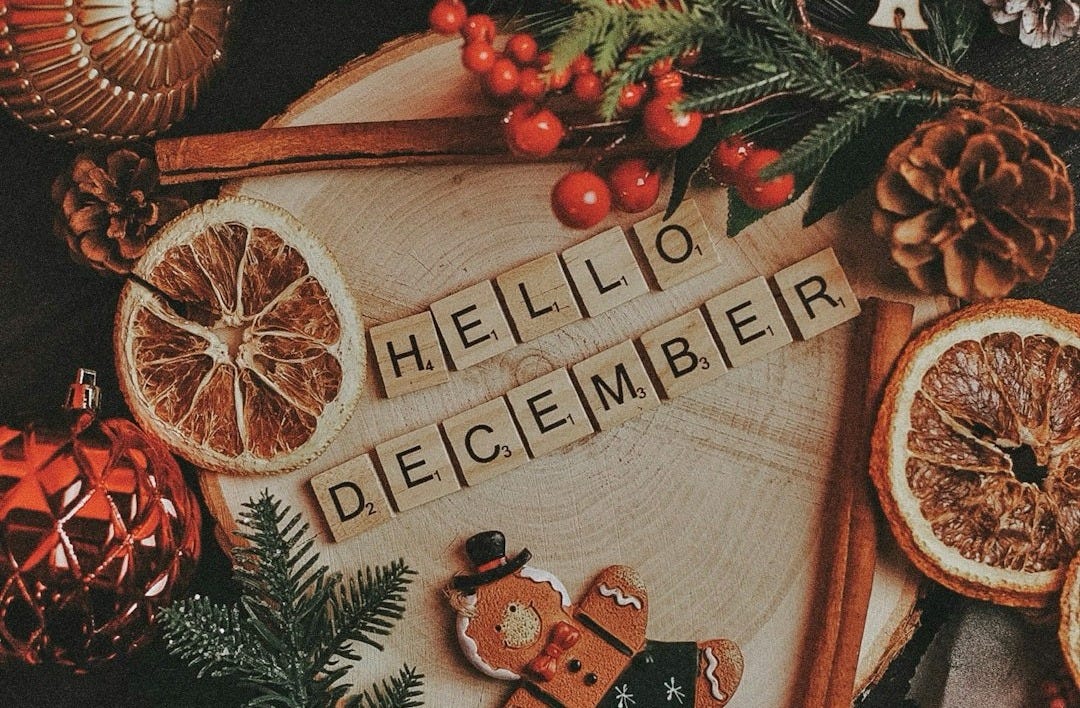 A table topped with oranges and pine cones