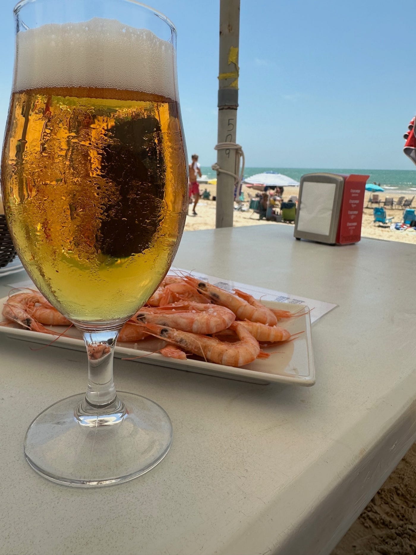 Grab a beer, and get some shrimp for free.