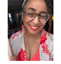 A person wearing glasses and a floral shirt

AI-generated content may be incorrect.