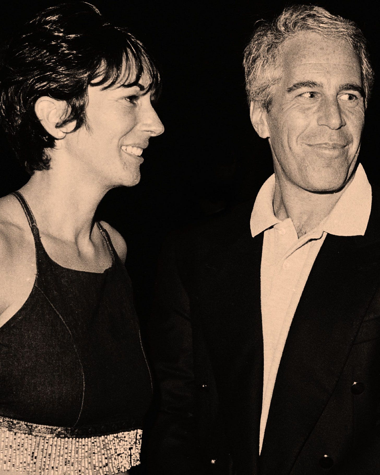 Image may contain Human Person Jeffrey Epstein Coat Clothing Overcoat Apparel Suit and Skin