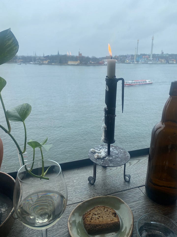 A art exhibition of a bejeweled women at the Fotografiska museum. The stunning view of the Stockholm harbor at the Fotografiska museum restaurant.