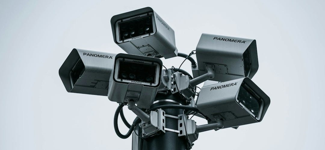 black and gray camera stand