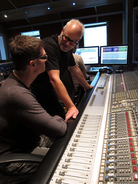 Inside a recording studio with lots of analog synthesisers. James Mottershead, Mark Cleator and Simon Campbell