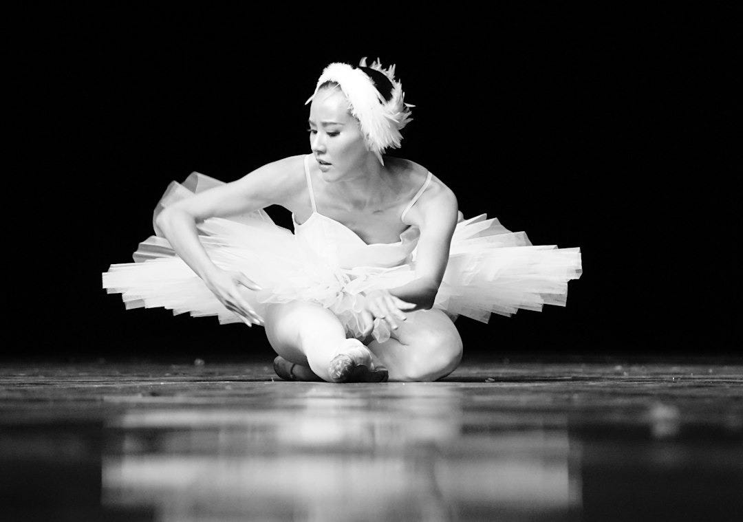 grayscale photo of woman in white dress