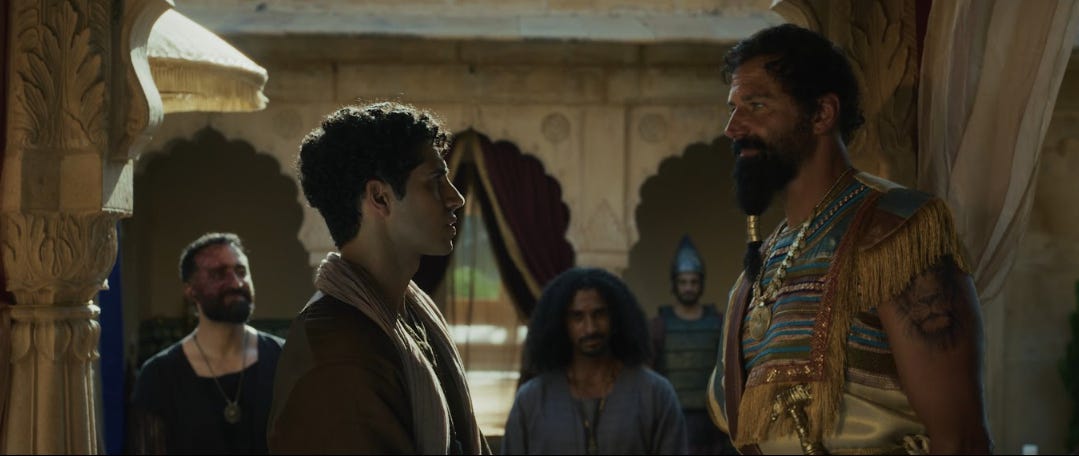 Mena Massoud as DANIEL and Elijah Alexander as NEBUCHADNEZZAR stare at each other in Ancient Babylon in a scene from the Kooman Brothers' new film Daniel and The Fiery Furnace