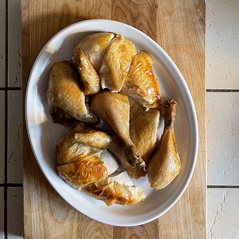 Roasted chicken carved, on a platter