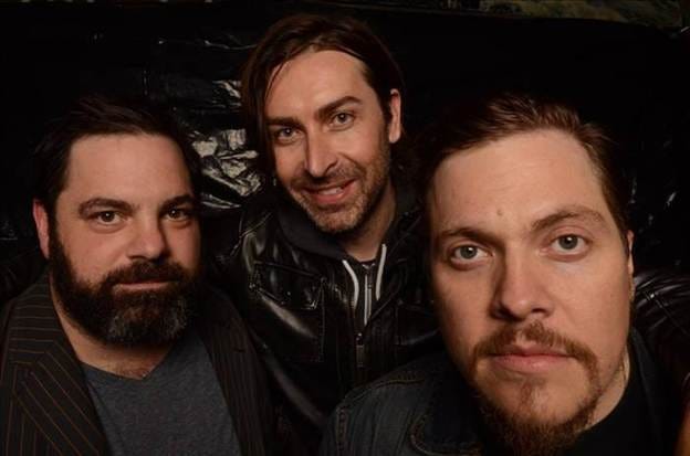 A group of men posing for a photo

AI-generated content may be incorrect.