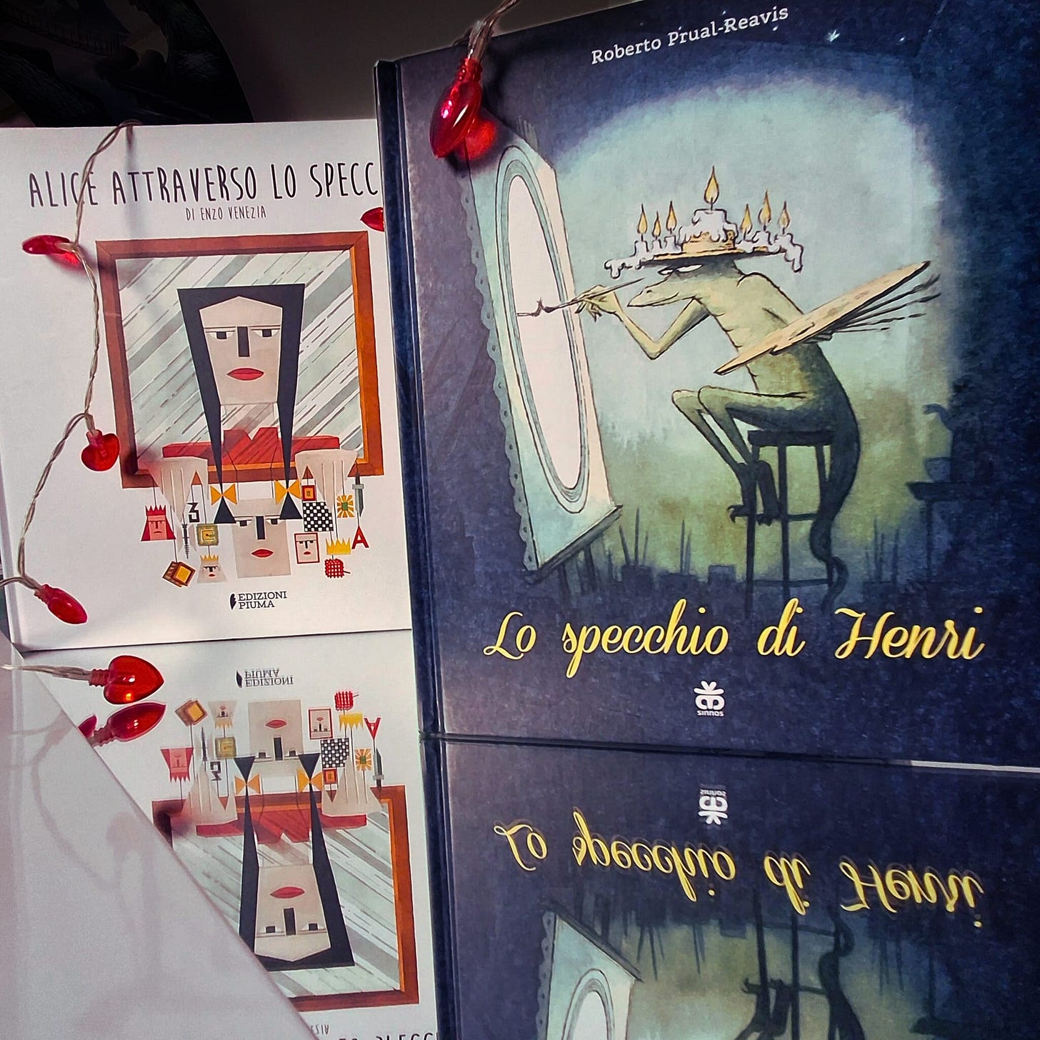 Enzo Venezia, Alice oltre lo specchio, Edizioni Piuma 2024; Roberto Prual - Reavis, Lo specchio di Henri, Sinnons Editrice 2020