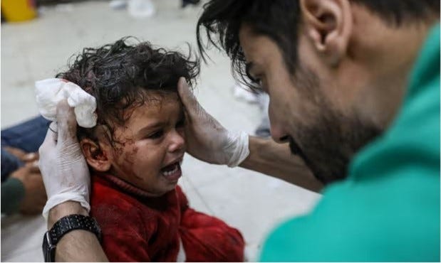 A Palestinian child injured in Israeli airstrikes is brought to Nasser Medical Hospital on December 26th. A Palestinian child injured in Israeli airstrikes is brought to Nasser Medical Hospital on December 26th.