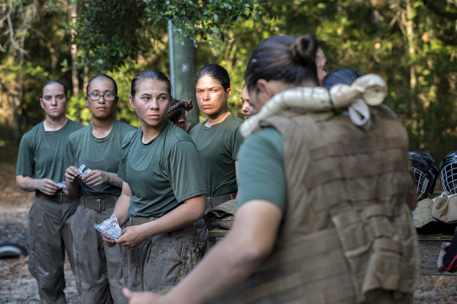 Members of a platoon of female U.S. Marine Corps recruits gear up before training in hand-to-hand combat at the Marine Corps Recruit Depot, Thursday, June 29, 2023, in Parris Island, S.C. Members of a platoon of female U.S. Marine Corps recruits gear up before training in hand-to-hand combat at the Marine Corps Recruit Depot, Thursday, June 29, 2023, in Parris Island, S.C.