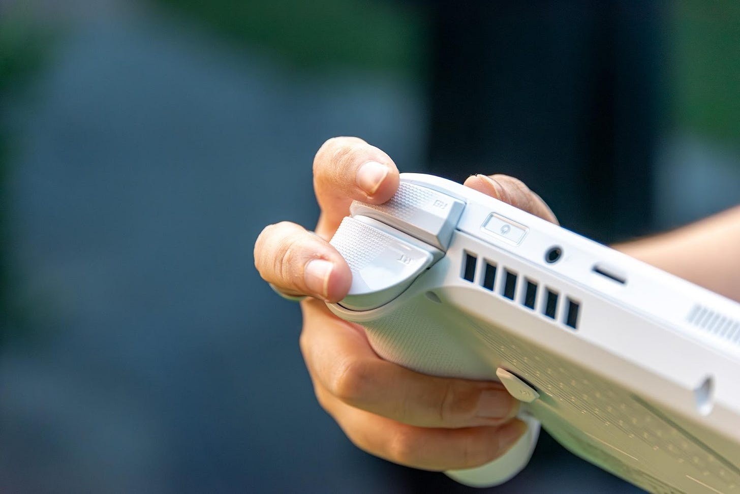 A person holding a video game controller
AI-generated content may be incorrect. A person holding a video game controller
AI-generated content may be incorrect.