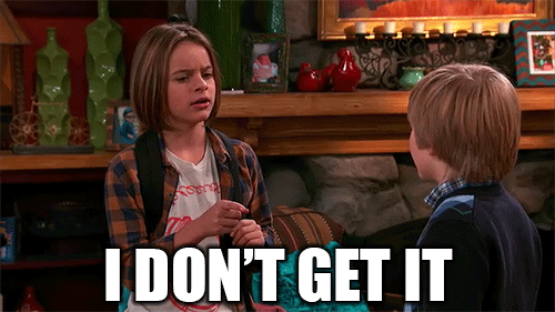 This may contain: two children sitting in front of a fireplace with the caption i don't get it