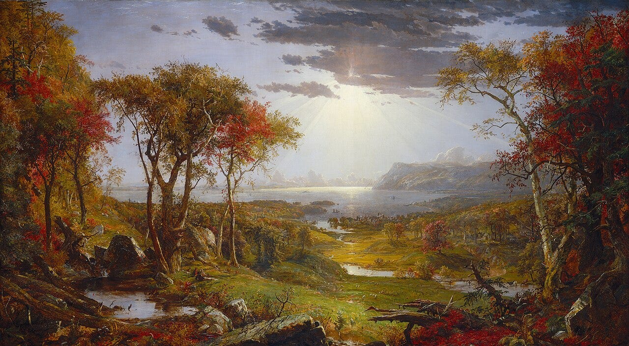 A scarlet and orange forest rolling toward blue mountains A scarlet and orange forest rolling toward blue mountains