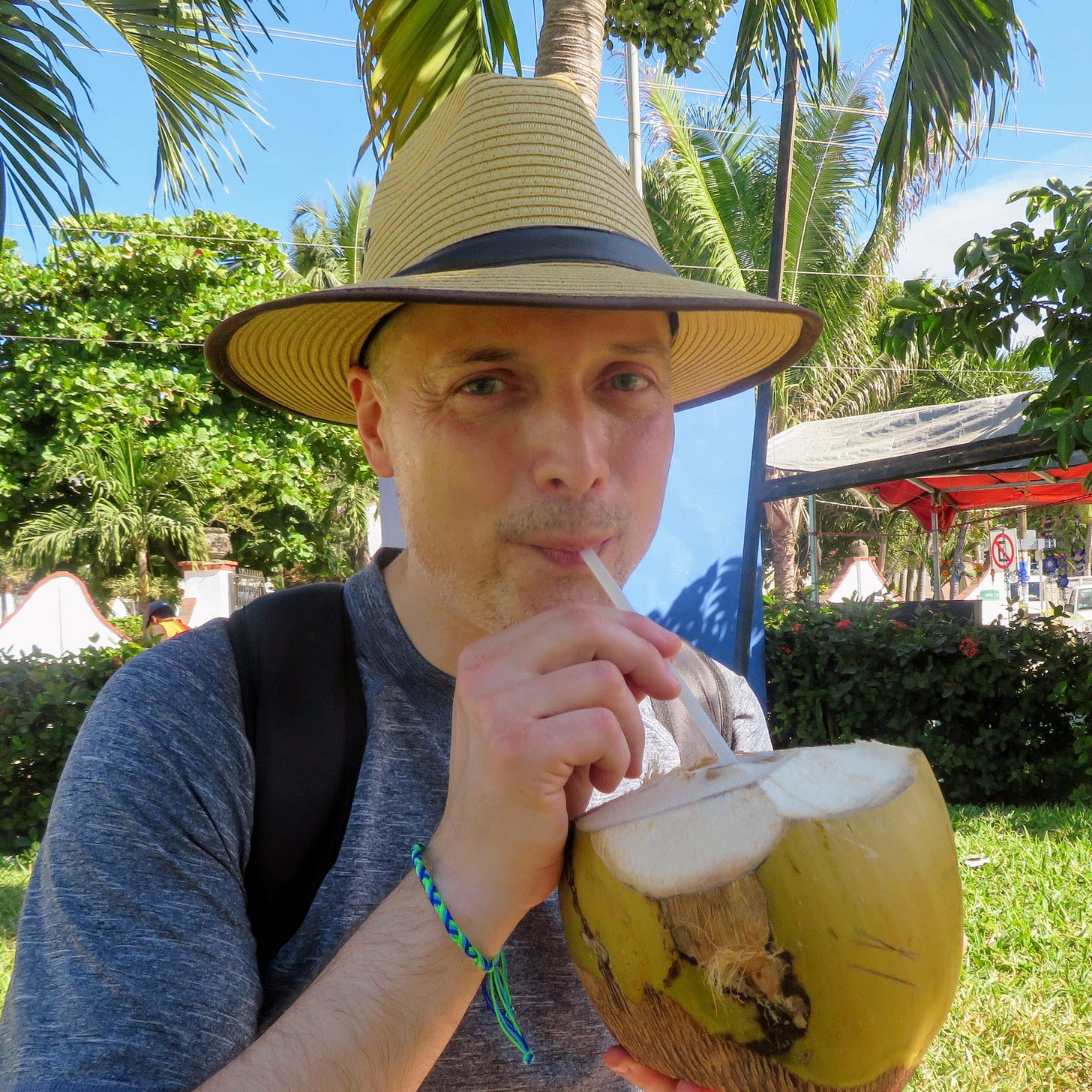 David enjoying fresh coconut water.