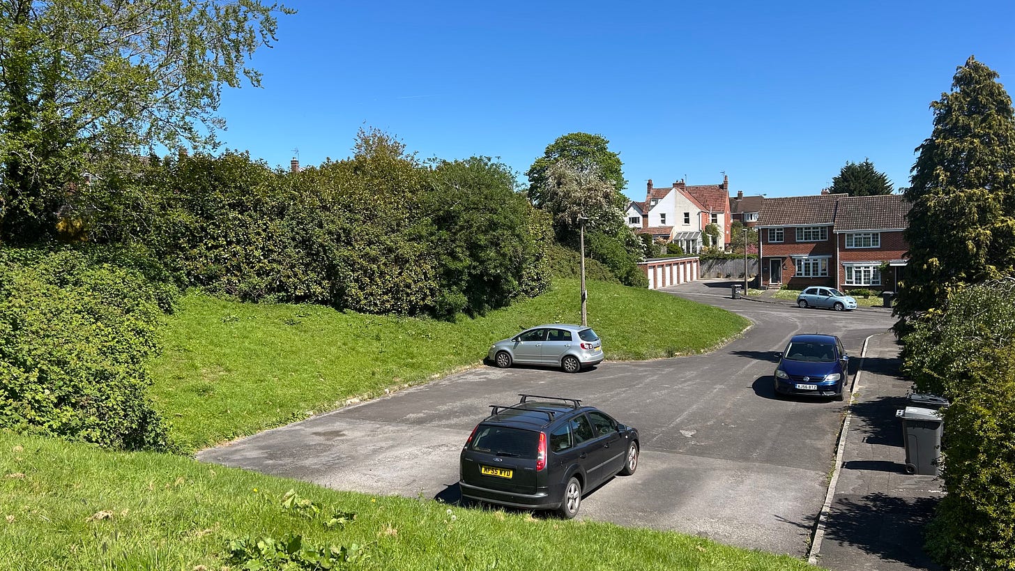 Looking into Cloford Close, Trowbridge from Broadmead. WE can see that an eara has been excavated and now is a modern housing area. 