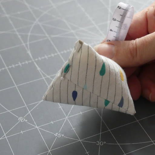 hand stitch raw edges
