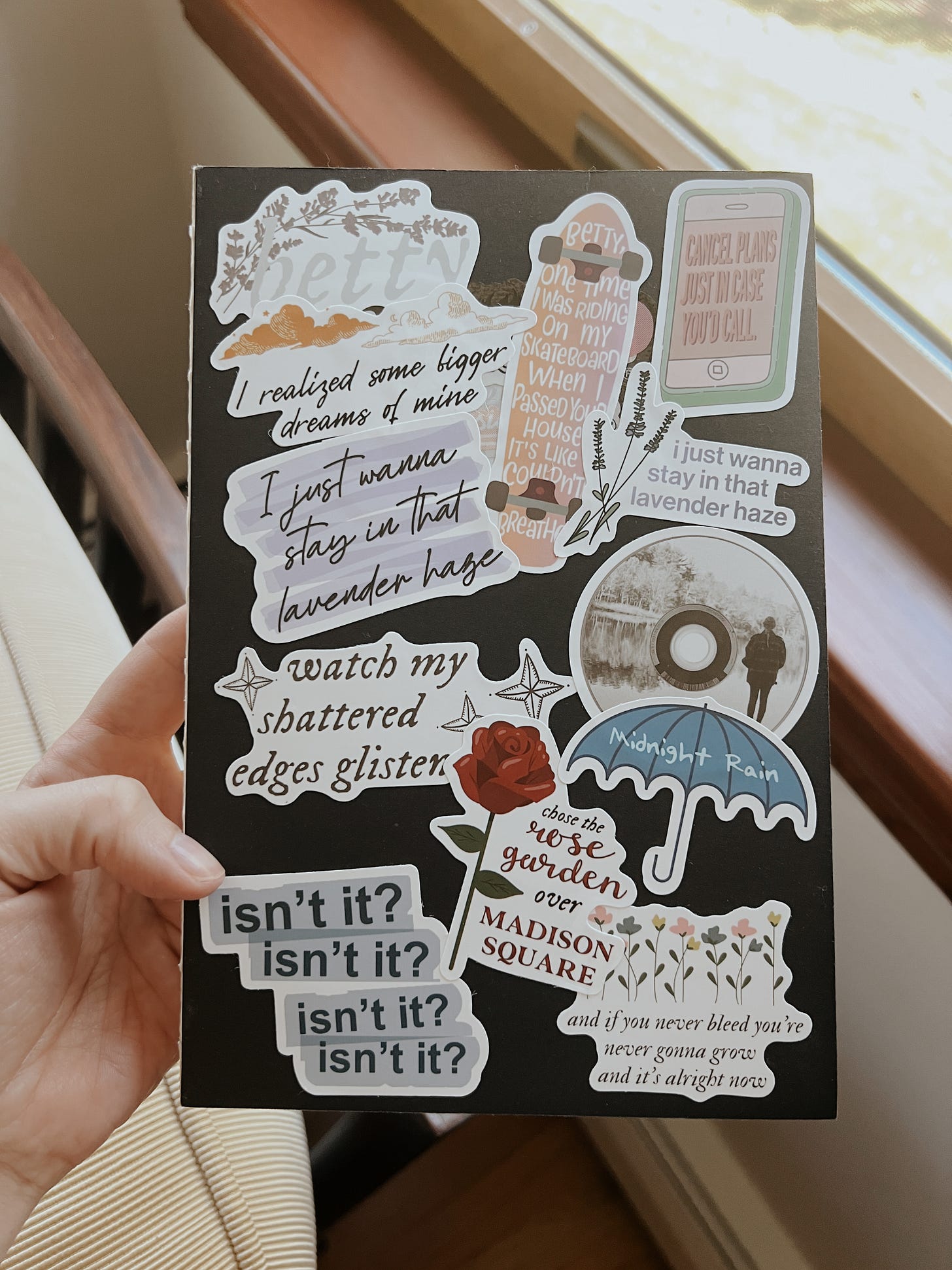 journal with fun stickers all over the cover
