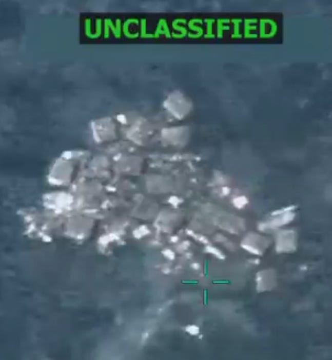 This portion of the military targeting video released by the US Department of Defense shows packages floating in the Eastern Pacific after the boat sank following a missile strike. This portion of the military targeting video released by the US Department of Defense shows packages floating in the Eastern Pacific after the boat sank following a missile strike.