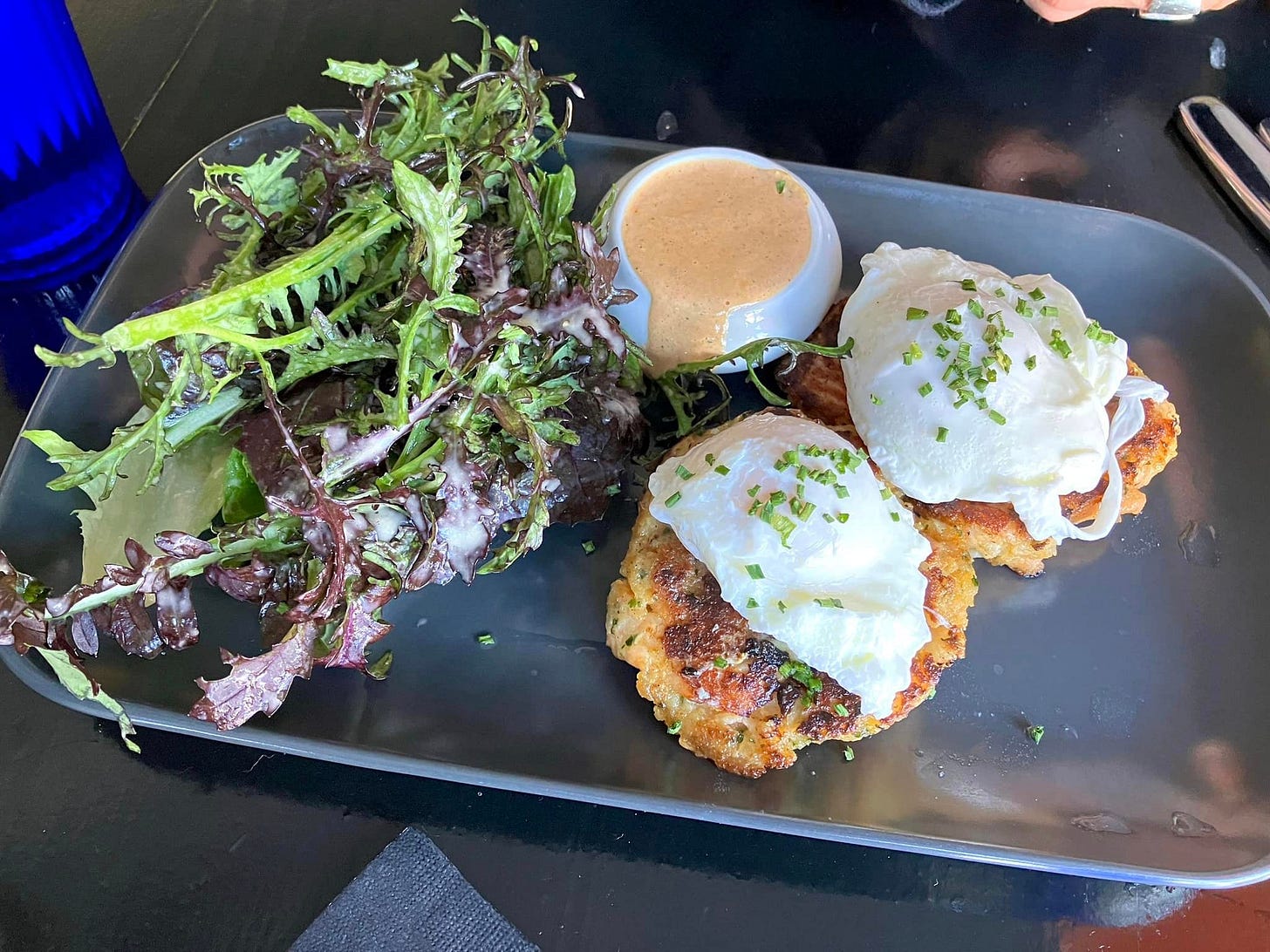 May be an image of scotch egg, poached egg and croquette