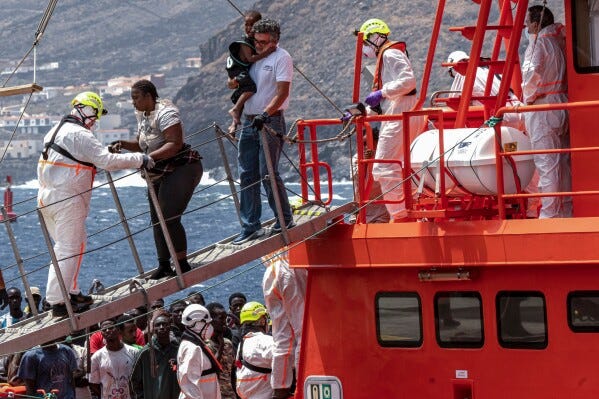 Migrants disembark at the port of "La Estaca" in Valverde at the Canary island of El Hierro, Spain, Monday, Aug. 26, 2024. (AP Photo/Maria Ximena, File)